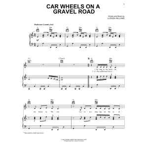 Car Wheels On A Gravel Road
