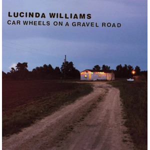 Car Wheels On A Gravel Road