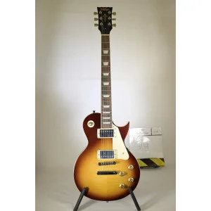 Vintage V100IT Guitar Flame Iced Tea | Guitarra eléctrica de segunda mano con defecto estético
