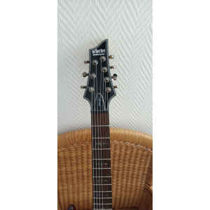 Schecter Damien 7 Elite Guitar and Peavey Amplifier