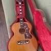 The Epiphone EJ 200 Masterbuilt is a stunning acoustic guitar that effortlessly combines classic aesthetics with modern craftsma