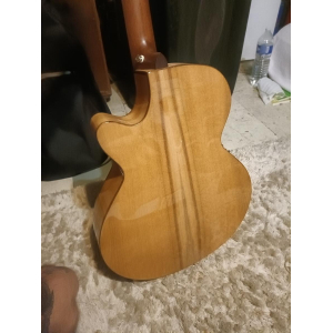 The Cort Myrtlewood SFX is a stunning acoustic-electric guitar with a unique tonewood construction. It features a solid Myrtlewo