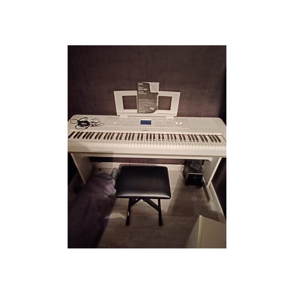 Yamaha DGX-660 is a versatile digital piano that combines high-quality sound with an extensive range of features. With its weigh