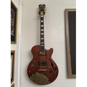 D'Angelico SS Grateful Dead is a limited edition electric guitar inspired by the iconic band. It features a semi-hollow body wit