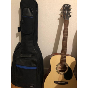 Cort AF510OP es una guitarra acústica de primera calidad con un sonido excepcional. Hecha con una tapa de abeto macizo y aros y