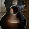 Gibson LG2 3/4 Arlo Guthrie is a limited edition acoustic guitar designed in collaboration with folk singer Arlo Guthrie. This s