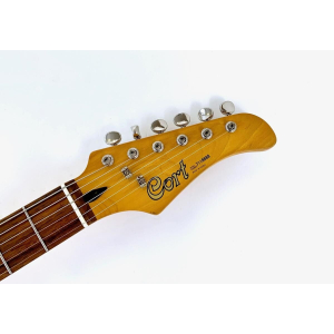 The Cort JC-65 Sparkling Red 1997 is a classic electric guitar that offers a combination of timeless design and exceptional play