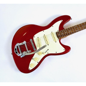 The Cort JC-65 Sparkling Red 1997 is a classic electric guitar that offers a combination of timeless design and exceptional play