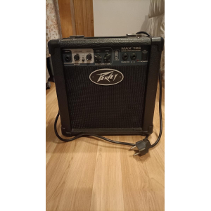 Bajo de 4 cuerdas Cort + amplificador Peavey + accesorios