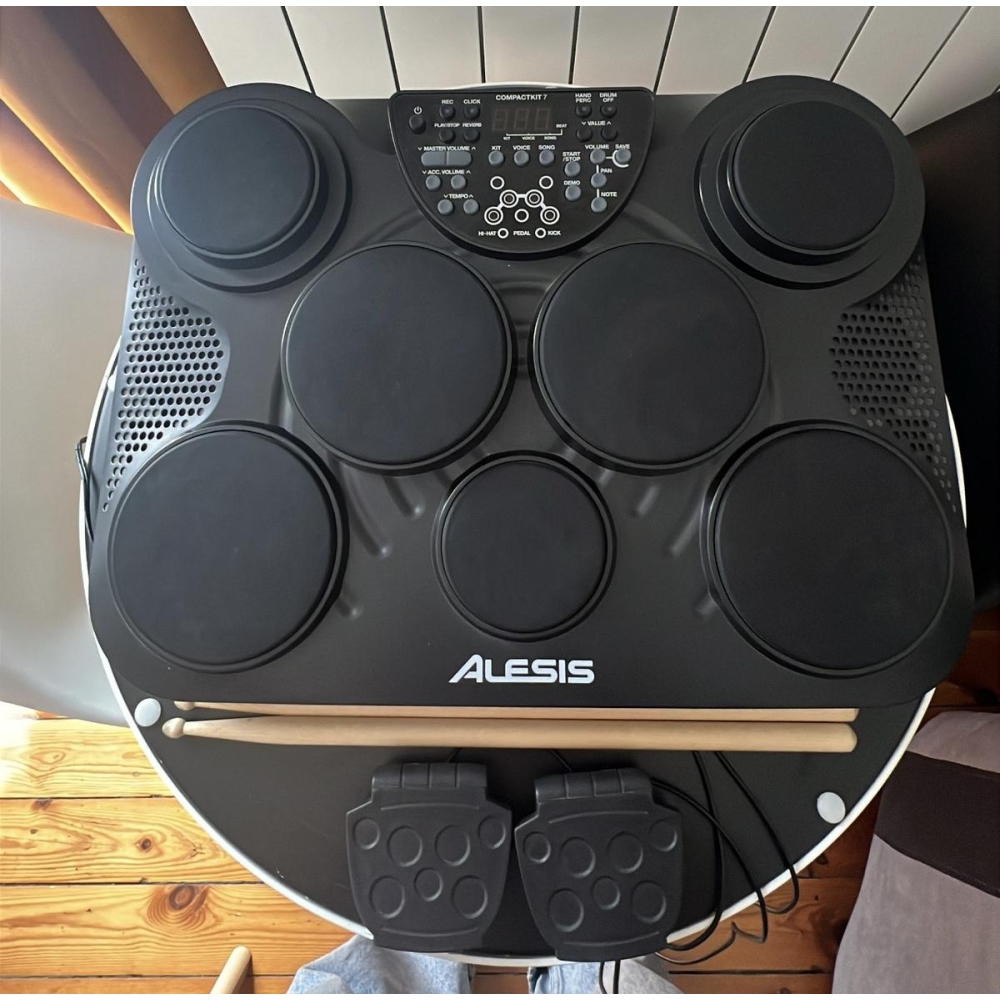The Alesis CompactKit 7 is a versatile and portable electronic drum kit designed for drummers of all skill levels. With its comp