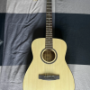 The Cort AF550 OP is a high-quality acoustic guitar that delivers exceptional sound and playability. With its solid spruce top a