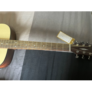 The Cort AF550 OP is a high-quality acoustic guitar that delivers exceptional sound and playability. With its solid spruce top a