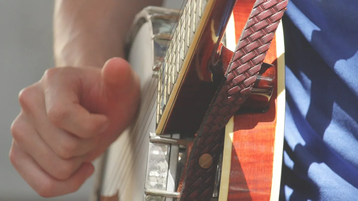 Musician playing acoustic guitar Musician playing acoustic guitar